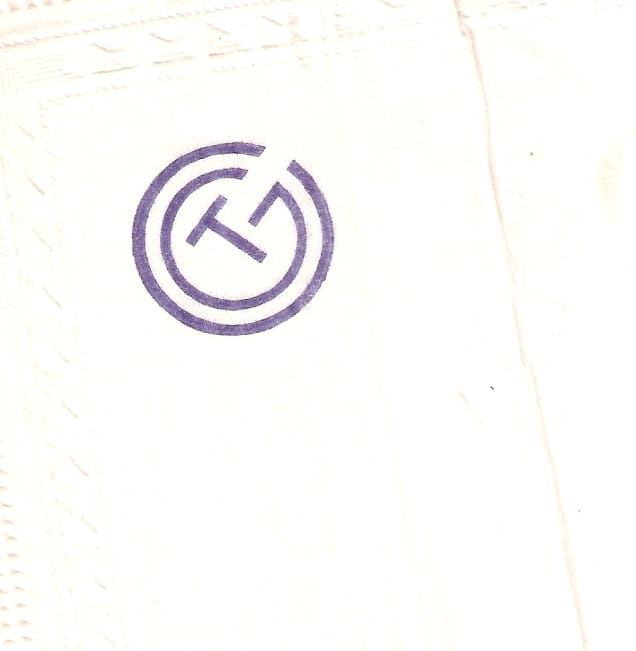 T G